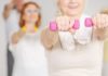 Best Multivitamin for Women Over 50 in 2020 exercise group of ladies with dumbbells after taking the multivitamins for women over 50 years old