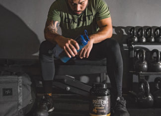 ONNIT Grass-Fed Whey Protein Review man post workout drinking an onnit grass-fed whey protein drink