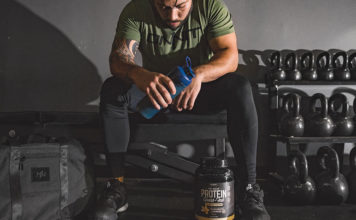ONNIT Grass-Fed Whey Protein Review man post workout drinking an onnit grass-fed whey protein drink